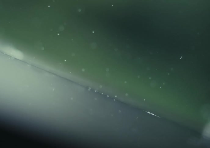 Closeup of raindrops falling in slow motion