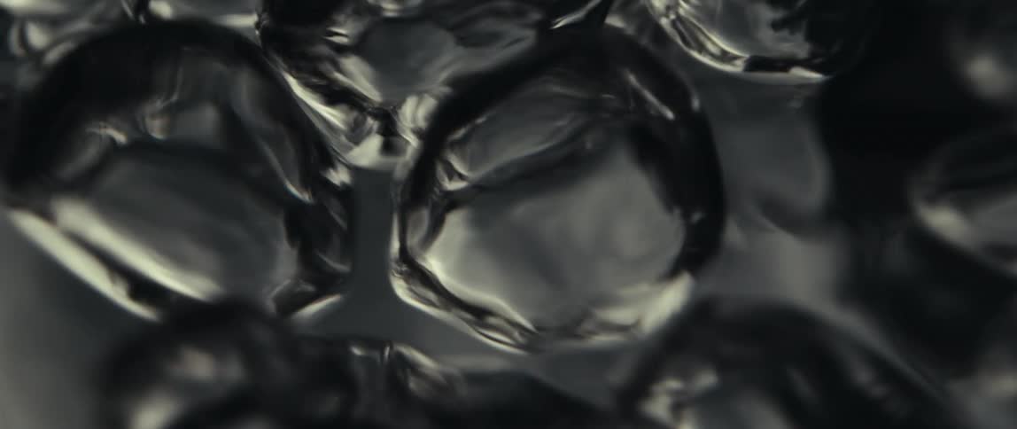 Fluid art of floating black bubbles
