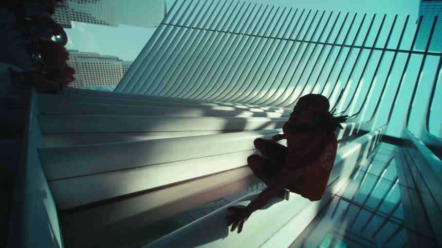 Man jumping in the middle of the city in a parkout movement