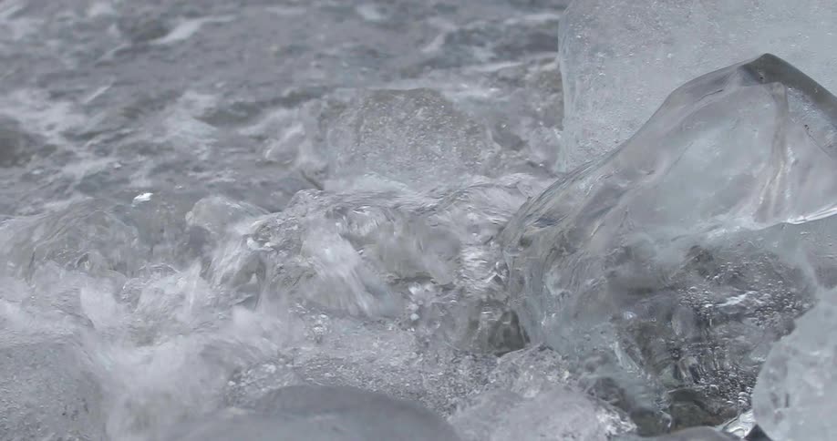 Water splashing over fragments of ice