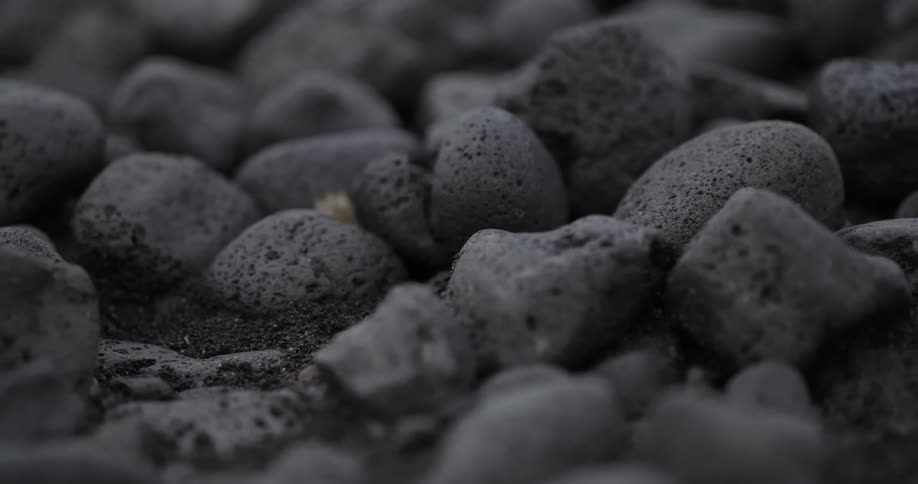Black rocks on the ground