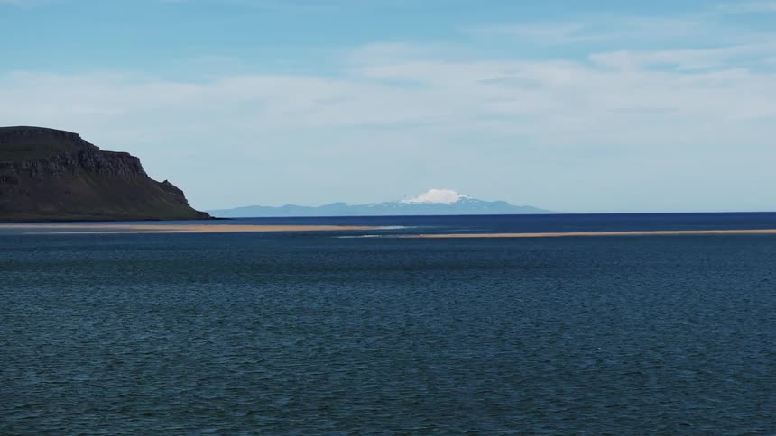 Sea landscape with a glacier in the horizon
