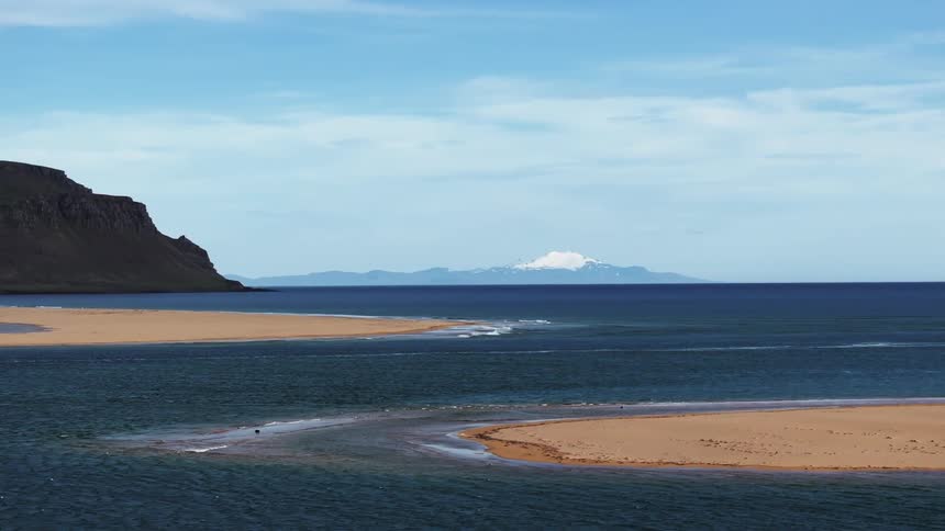 Aerial panorama of the sea with small sand islands