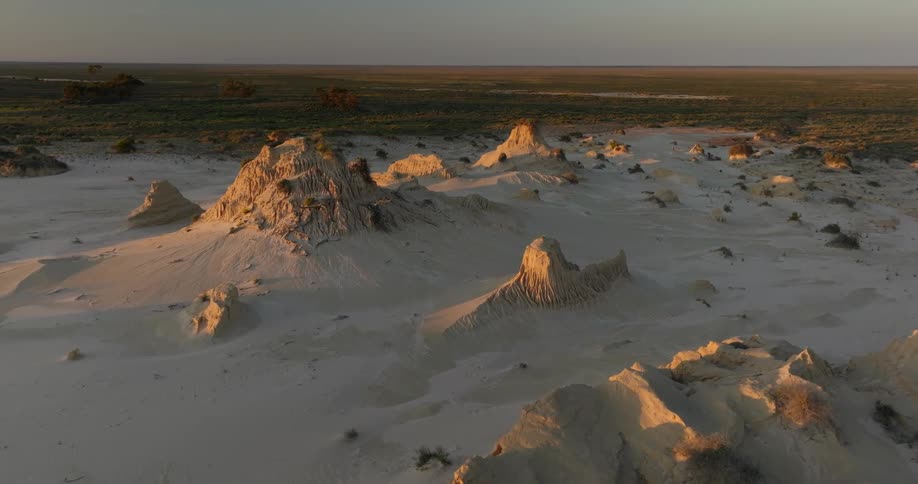 Aerial of a desert with sandy mountain ranges