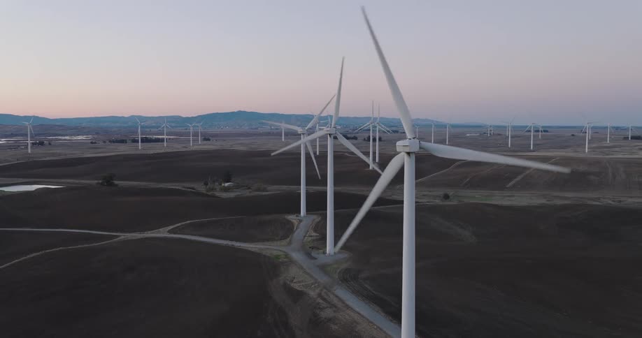 Aerial of a wind farm in a rural town