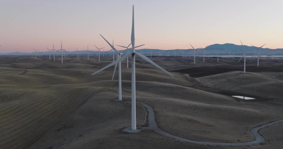A wind farm in a rural area near a river