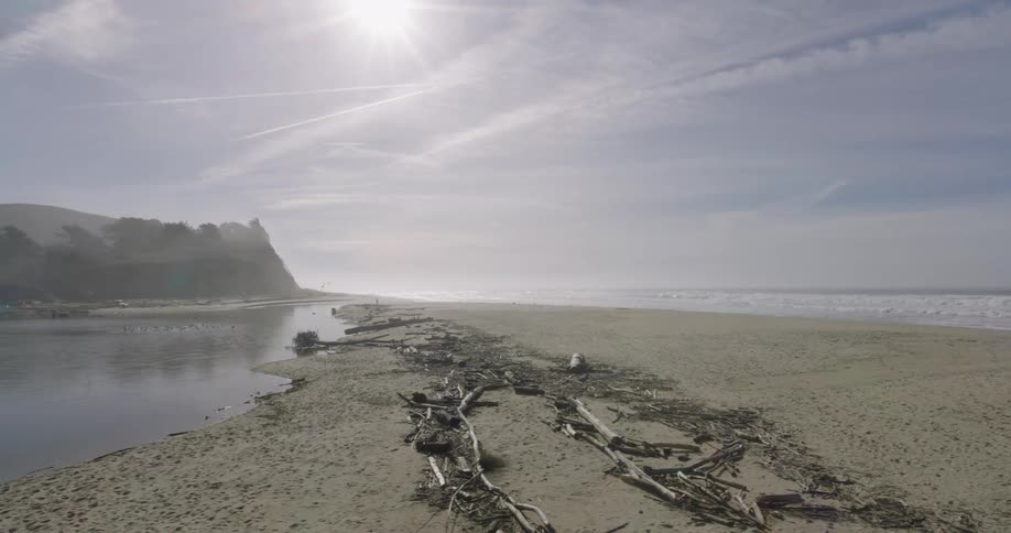 Landscape of a beach with calm water next to the coastline