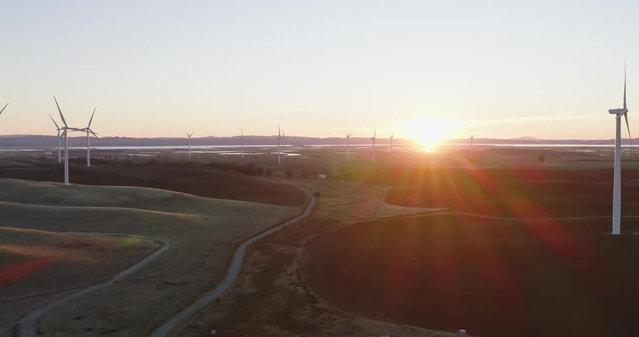 Aerial of a wind farm during sunset