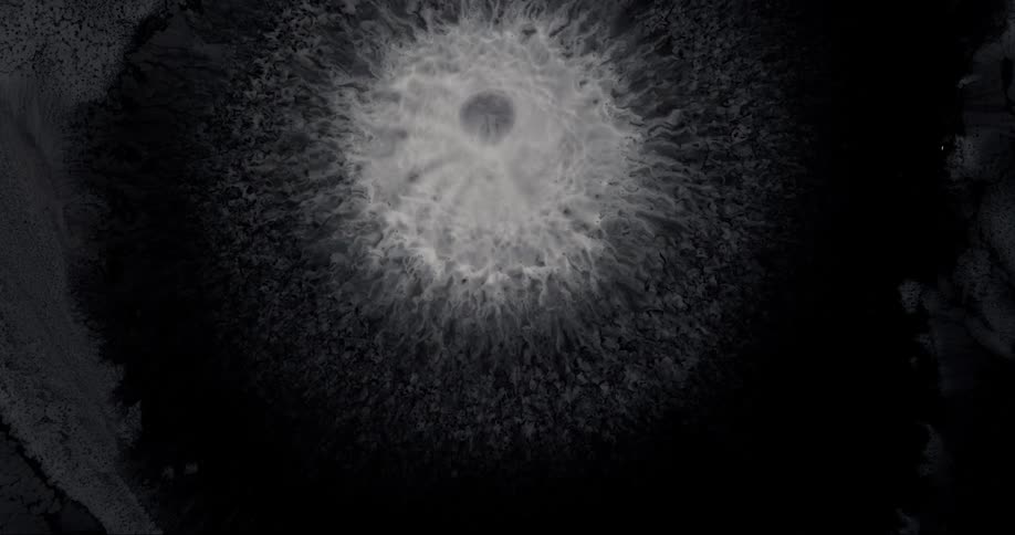 Dense and abstract liquid in microscopic view moving in an abstract manner in slow motion