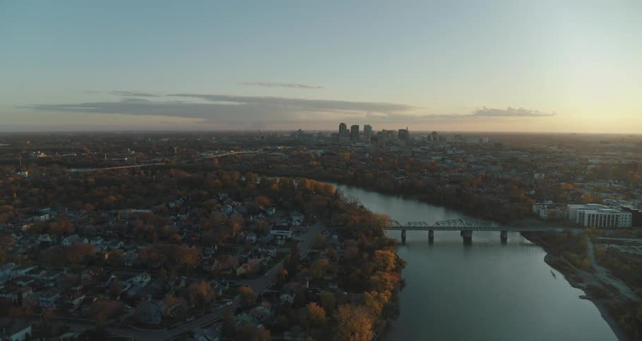 Aerial panorama of downtown Winnipeg with Red River in foreground