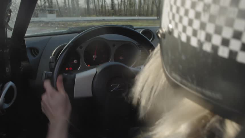 A woman is racing on the runway
