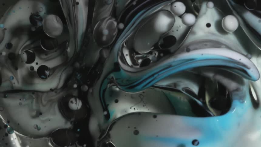Abstract chaotic blue and white moving colors underwater
