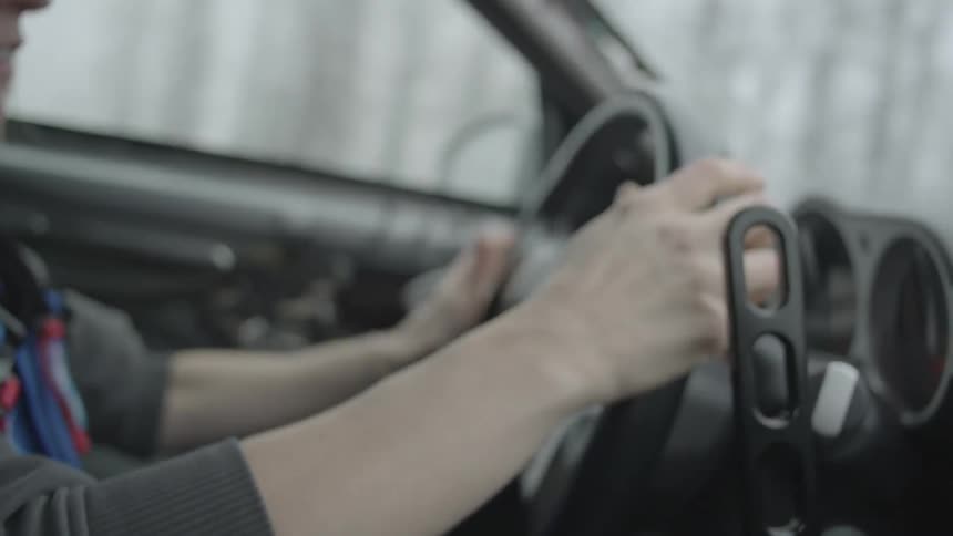 A woman driving a car in a rally