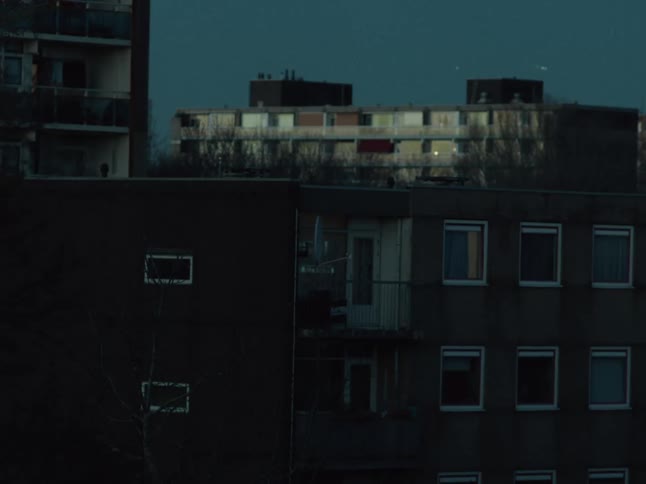 Airplanes fly over the apartments in the city at morning