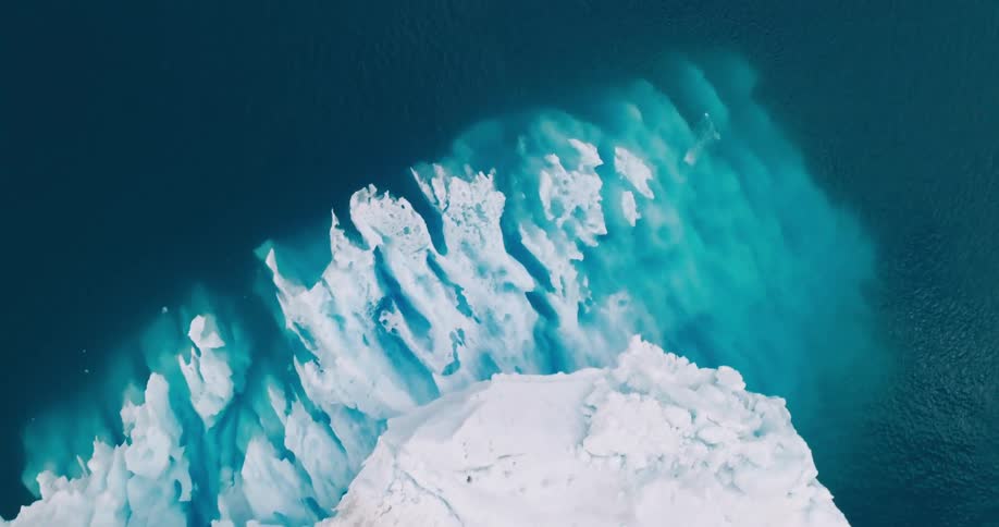 An aerial view of an iceberg in the arctic
