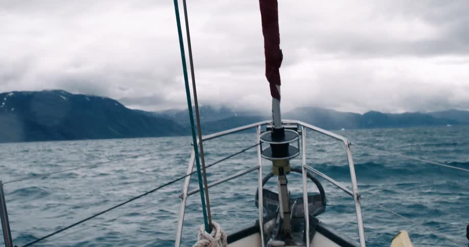 A boat riding in the sea