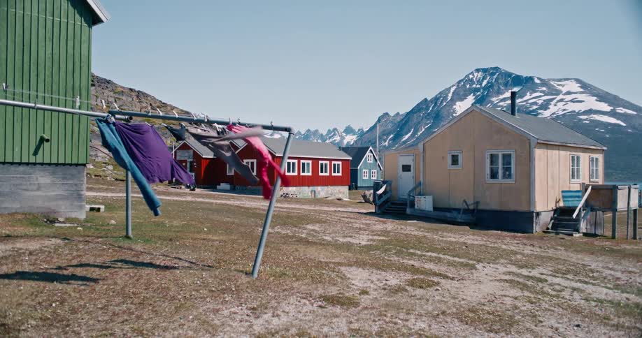 A clothesline swinging against the wind in a small town
