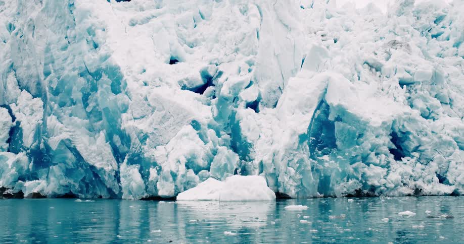 A large wall of ice on the water