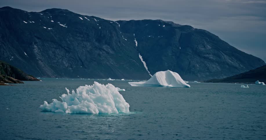 Melting ice floats off the arctic coast
