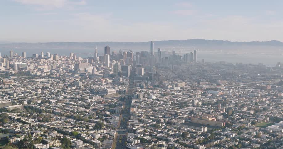 A large city is shown with several buildings from an aerial view