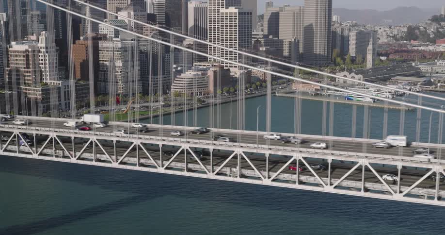 Skyline of a suspension bridge in urban city during daytime