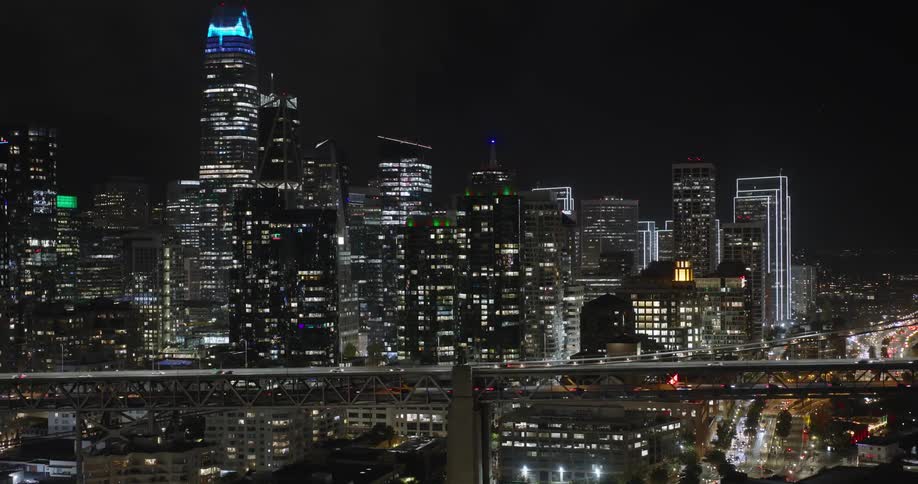 Aerial view of a bridge in the city at night