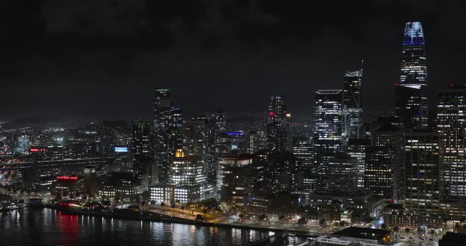 The city is brightly lit at night