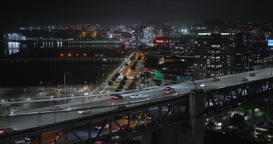 Traffic on a highway in the city a night