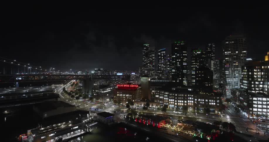 Aerial view of illuminated skyscrapers and waterproof