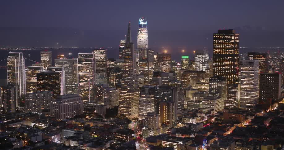 Aerial panorama of a metropolis with skyscrapers at night