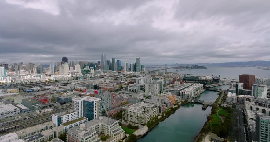 Aerial panorama of a metropolis by the sea on a cloudy day