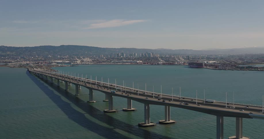 An elevated highway bridge over a large body of water