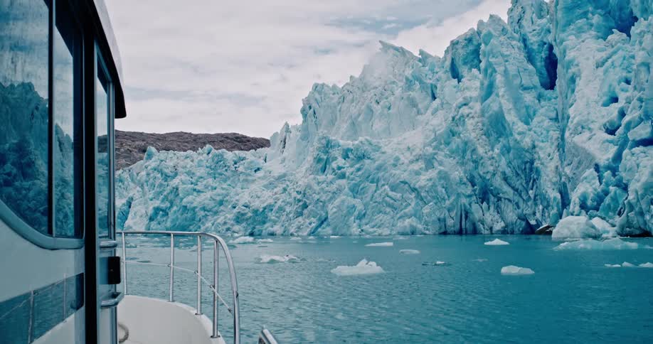 A view from a boat of a large glacier