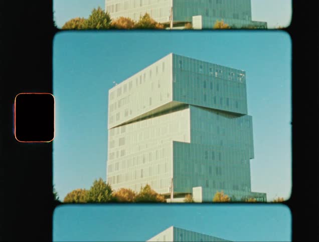 Irregular stacked building in the ciyt caught on vintage film