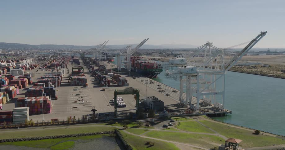 Panorama of a logistic center with containers by the edge of a lake