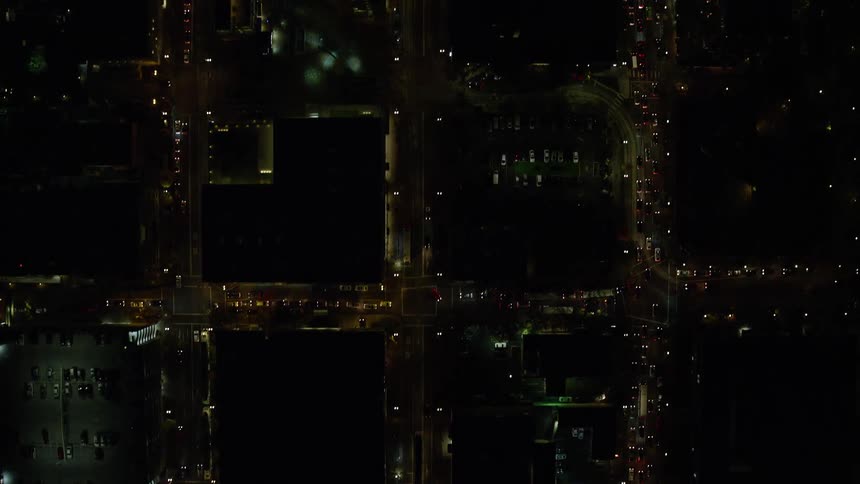 Aerial panorama of a metropolis with nighttime skyscrapers