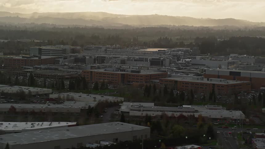 Aerial view of a large manufacturing area in a town