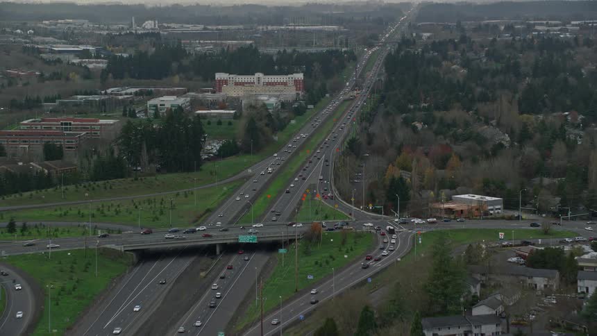 Aerial view of the highway in a suburban neighborhood during the day