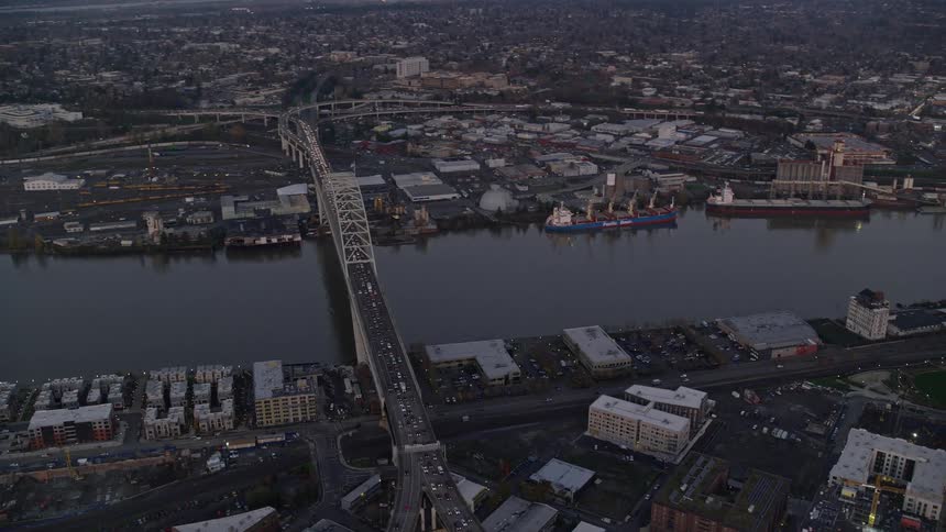 Traffic runs over the bridge in the city