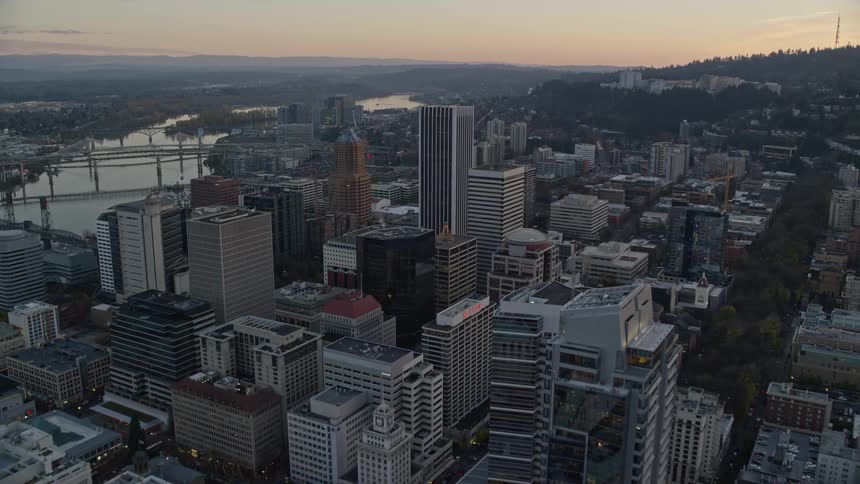The sun is rising on the city