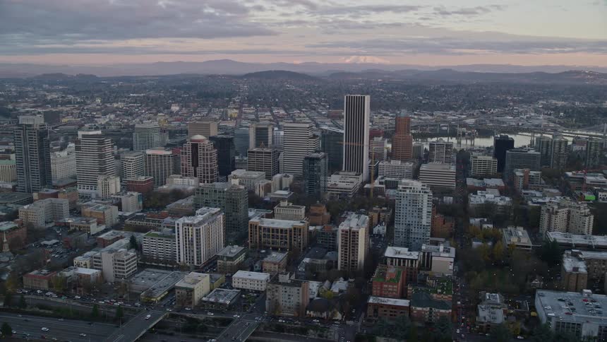 Aerial of cityscape with riverfront buildings