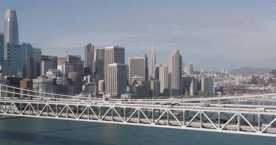 Landscape of vehicles moving on a city bridge on a sunny day