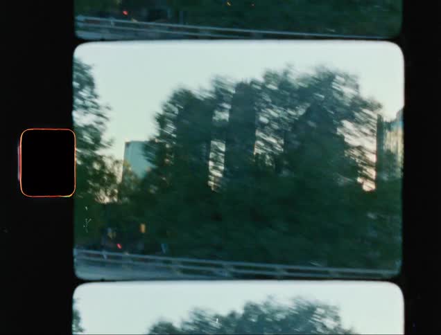 View from inside a moving car with buildings in a metropolis