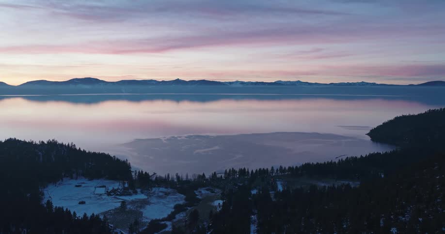 A large lake is near the forest