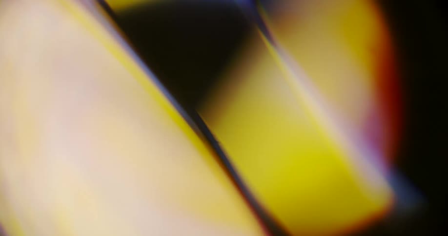 Close up of moving geometric shapes reflection lights