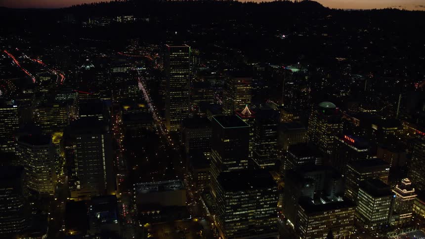 The city is brightly lit at night