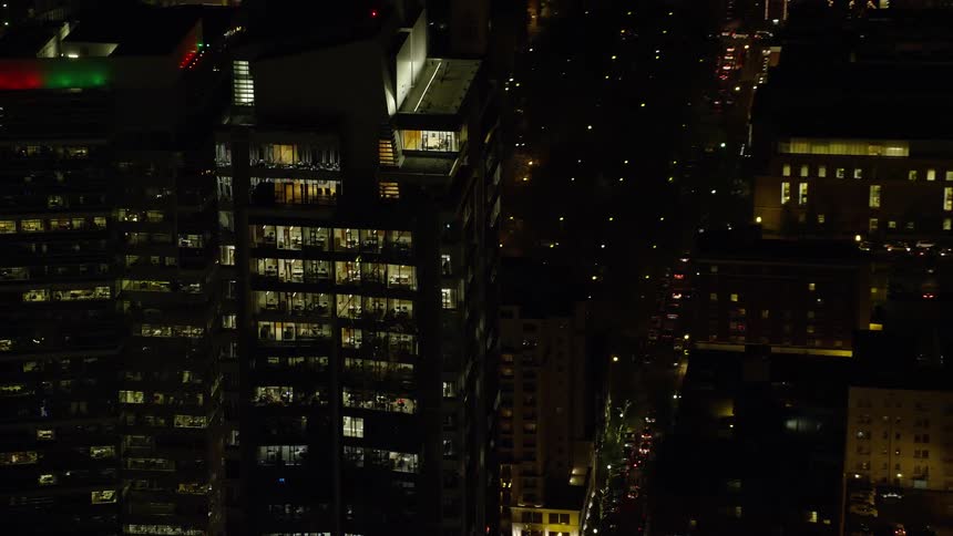 Skyline of an illuminated tower in an urban city at night