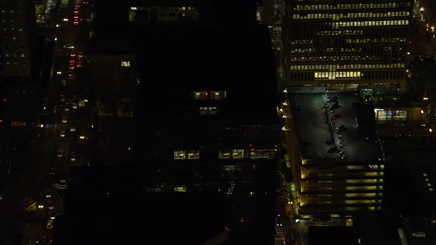 The buildings downtown are lit up in the middle of the night