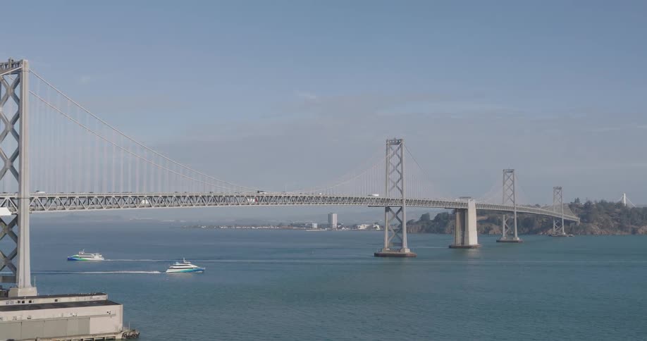 Aerial view of yachts under the san francisco oakland bridge