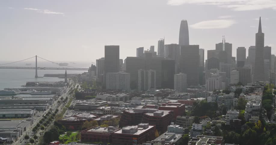 Aerial view of a metropolis by the sea in the morning